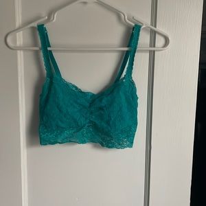 Teal lace bralette. Excellent condition. Never worn. Slip on style.
